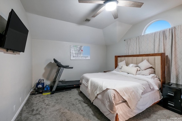 carpeted bedroom with ceiling fan and lofted ceiling