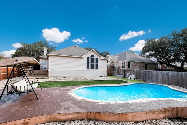 view of pool with a patio