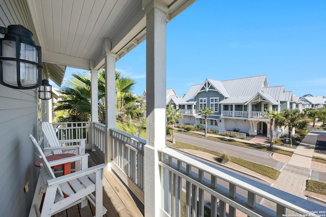 balcony featuring covered porch