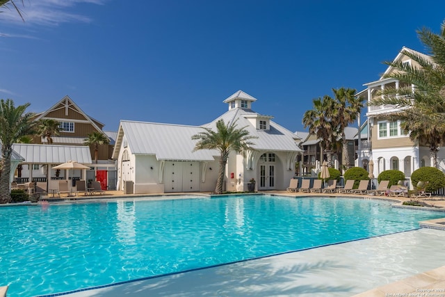 view of swimming pool with a patio