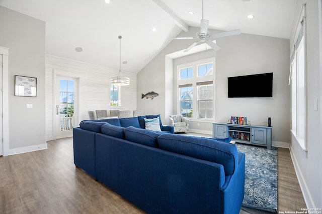 living room featuring beamed ceiling, dark hardwood / wood-style floors, ceiling fan, and high vaulted ceiling