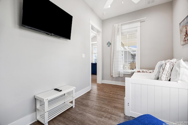 bedroom featuring ceiling fan and wood-type flooring