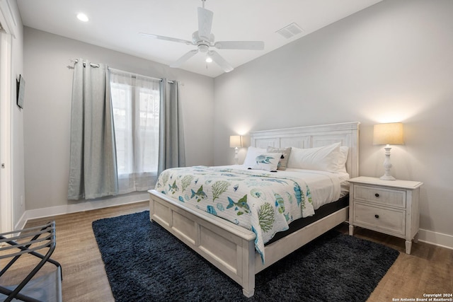 bedroom featuring ceiling fan and light wood-type flooring