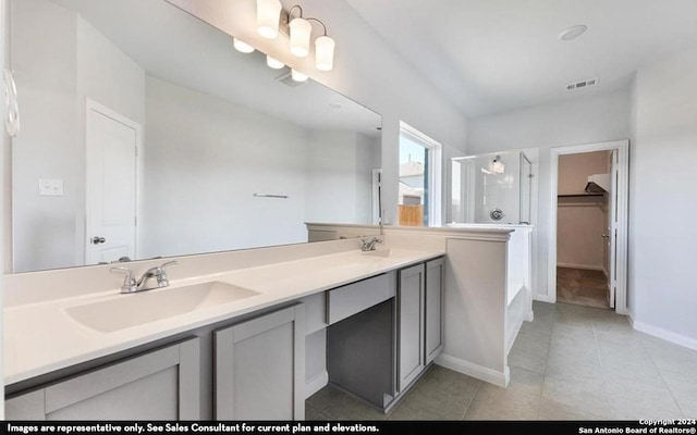 bathroom featuring vanity and a shower with shower door