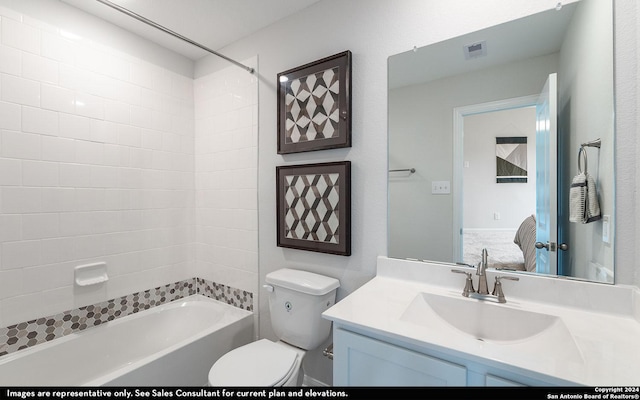 full bathroom with vanity, bathtub / shower combination, and toilet