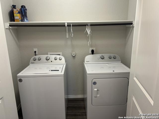 washroom featuring independent washer and dryer