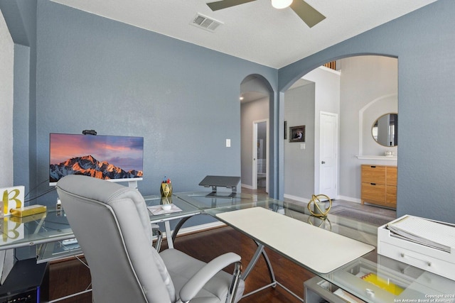 office space with hardwood / wood-style flooring and ceiling fan