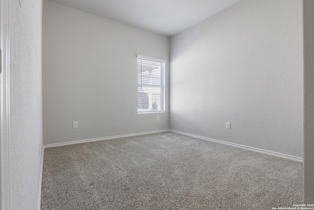 unfurnished room with carpet floors