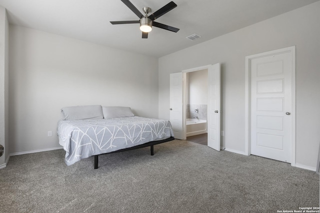 carpeted bedroom with connected bathroom and ceiling fan