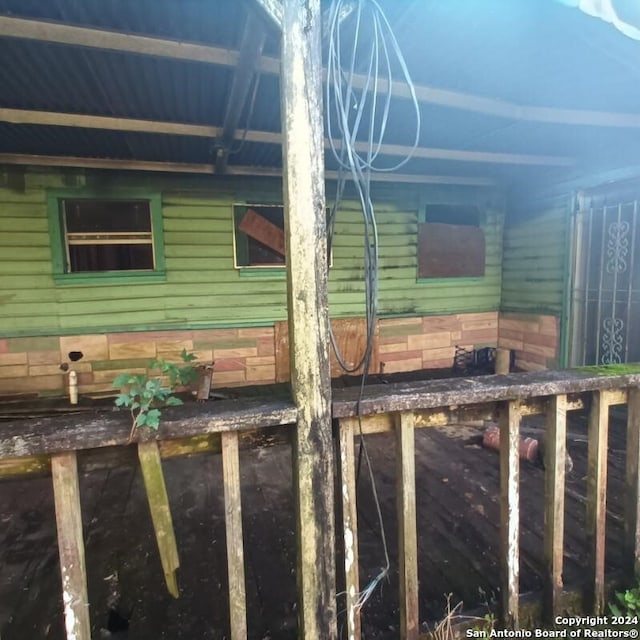 view of side of home with an outbuilding