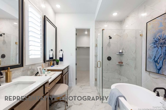 bathroom with vanity, tile walls, and plus walk in shower