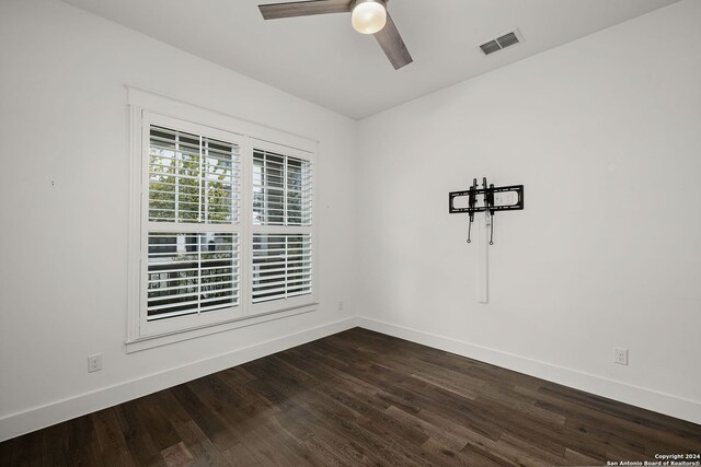 653 Center Grn, New Braunfels, TX 78130 - spare room featuring ceiling fan and dark wood-type flooring