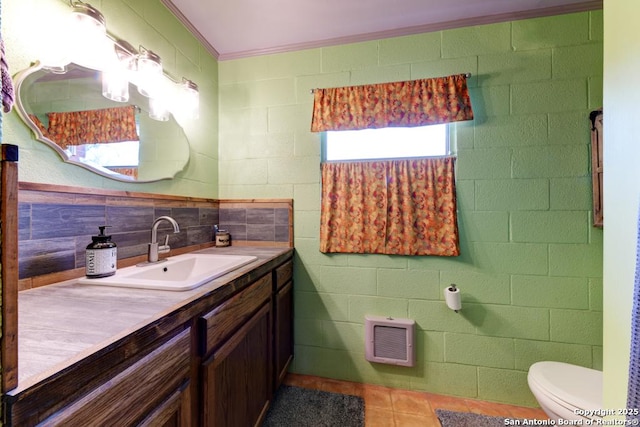 bathroom with tile patterned floors, vanity, and toilet