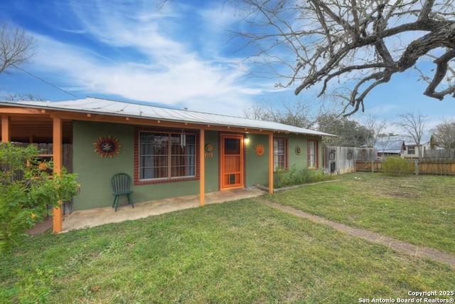 ranch-style house with a front yard