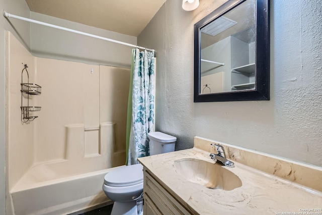 full bathroom with vanity, toilet, and shower / bath combo with shower curtain