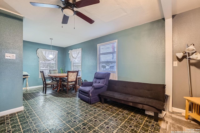 living room with ceiling fan