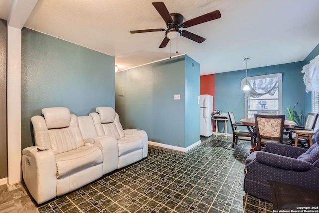 living room featuring ceiling fan