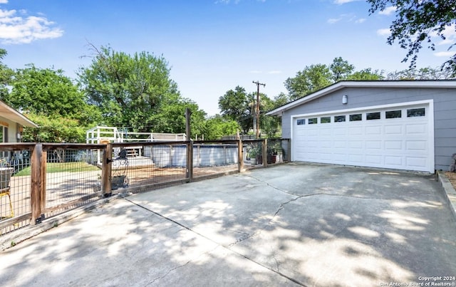 garage featuring cooling unit