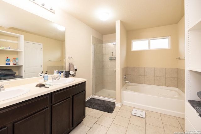 bathroom featuring tile patterned floors, separate shower and tub, and vanity