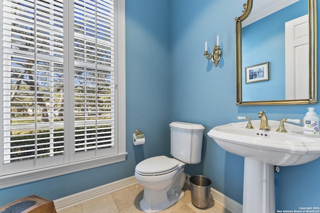 bathroom featuring tile patterned floors and toilet