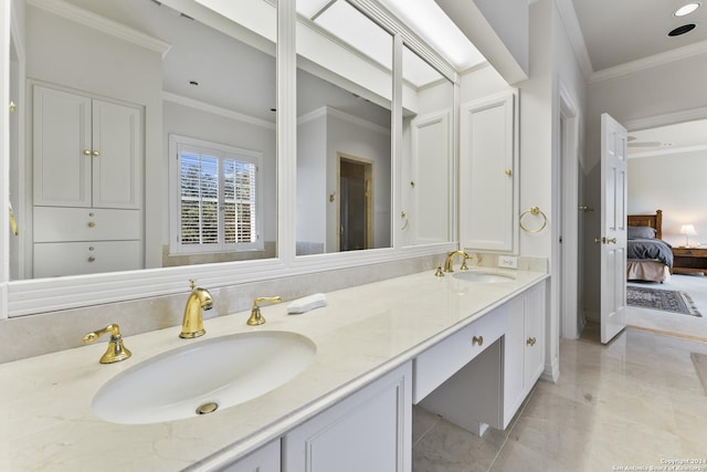 bathroom featuring vanity and ornamental molding