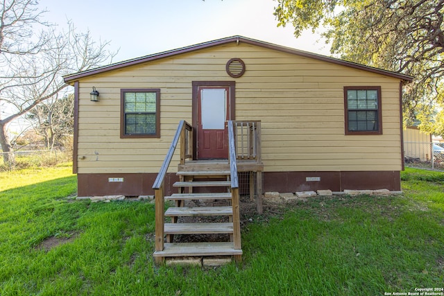 exterior space featuring a front lawn