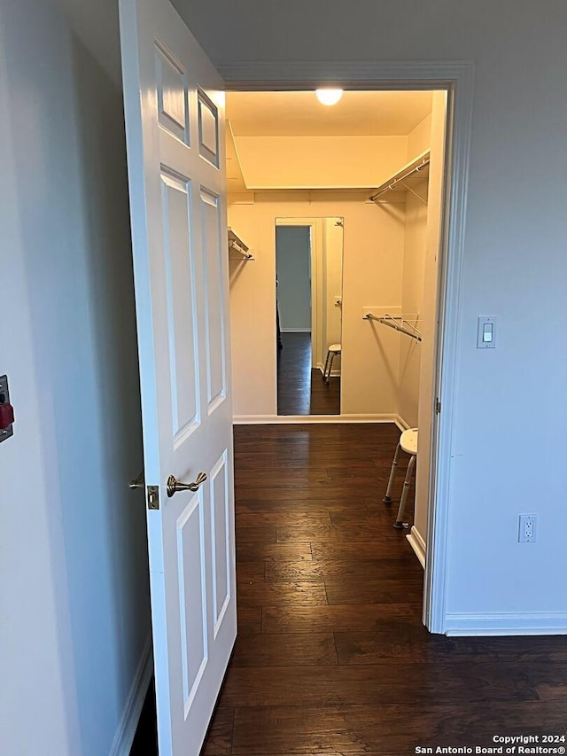 hallway featuring dark hardwood / wood-style floors