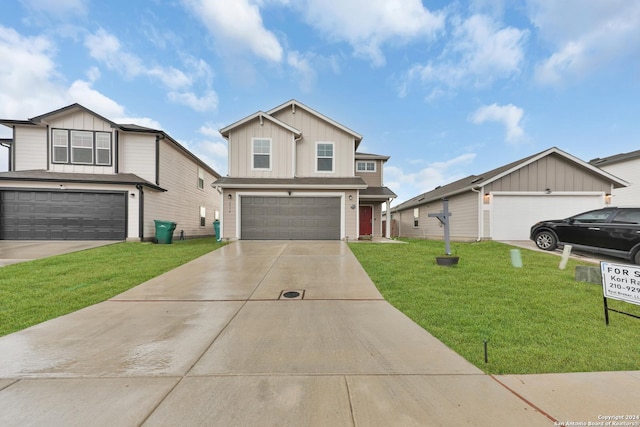 view of front of house featuring a front yard and a garage