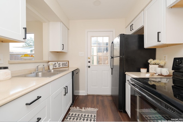 kitchen with black appliances, white cabinets, sink, and dark wood-type flooring