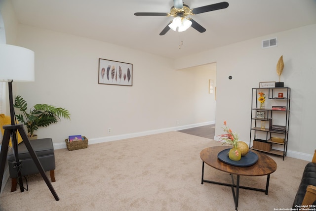 sitting room featuring carpet flooring and ceiling fan