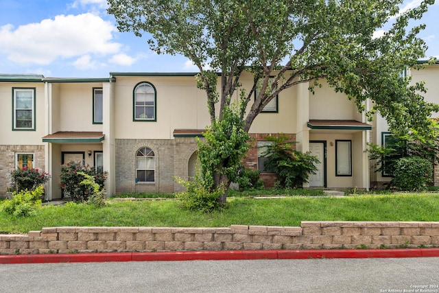 view of front of home with a front yard