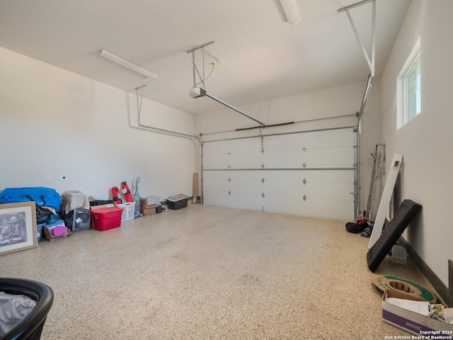 garage featuring a garage door opener