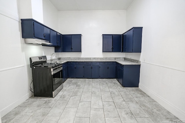 kitchen featuring sink, ornamental molding, blue cabinetry, and stainless steel gas range