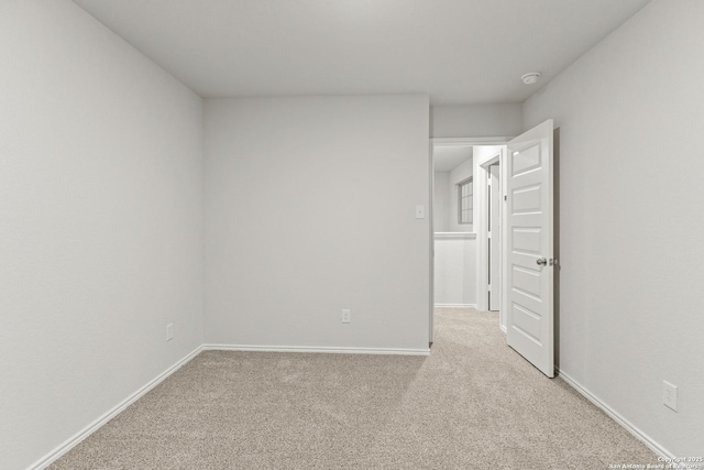 2659 Greenwell Ln, New Braunfels, TX 78130 - unfurnished bedroom featuring light carpet