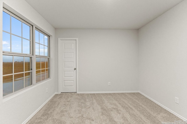 2659 Greenwell Ln, New Braunfels, TX 78130 - spare room with light carpet and baseboards