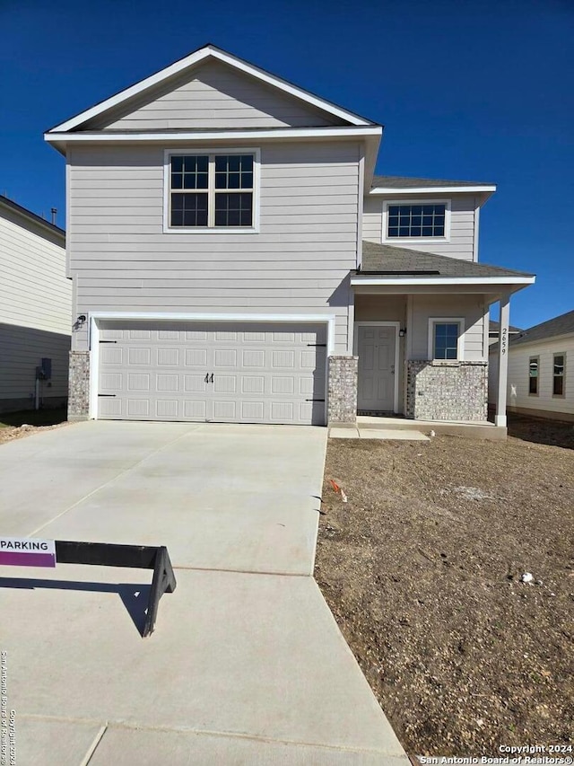 view of front of property featuring a garage