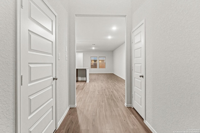 2659 Greenwell Ln, New Braunfels, TX 78130 - hall featuring wood finished floors and a textured wall