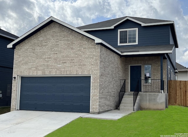 view of property featuring a front yard