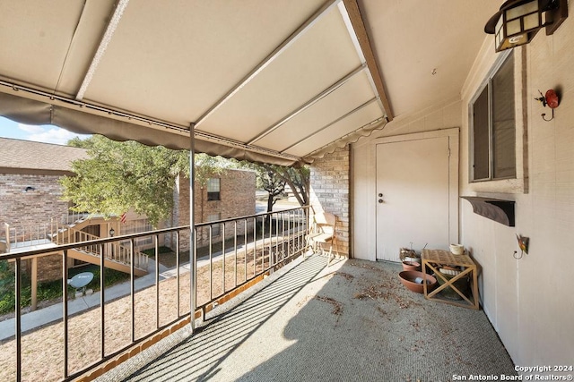 view of patio / terrace with a balcony