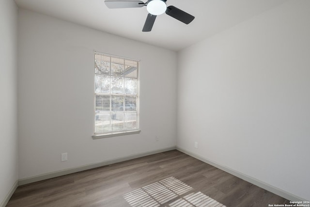 unfurnished room with light hardwood / wood-style flooring and ceiling fan