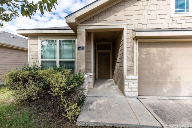 property entrance featuring a garage