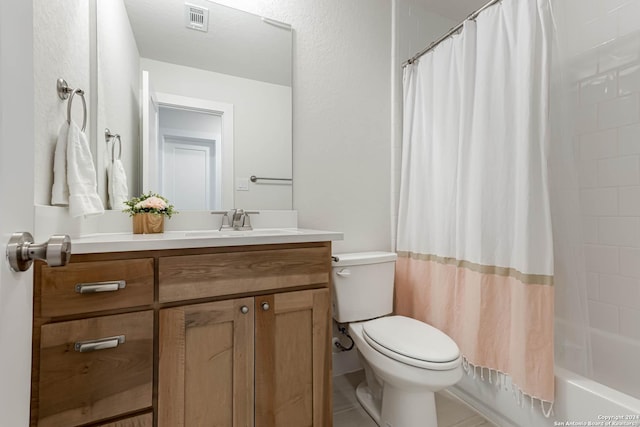 full bathroom featuring vanity, toilet, and shower / bath combo with shower curtain