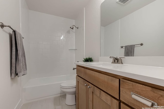 full bathroom featuring shower / washtub combination, vanity, and toilet