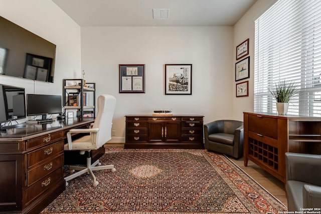 home office featuring light hardwood / wood-style floors