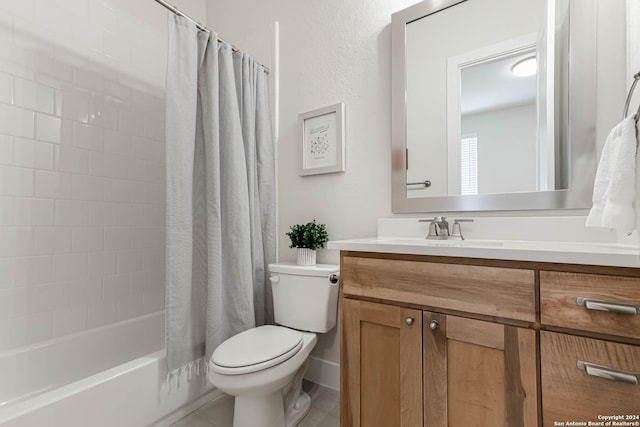 full bathroom with tile patterned flooring, vanity, shower / tub combo, and toilet