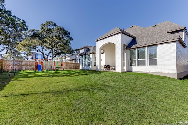 view of yard featuring a playground