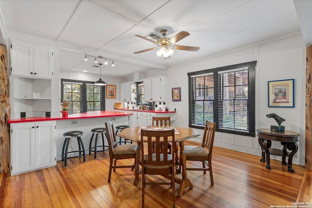 dining area featuring plenty of natural light, ceiling fan, and light hardwood / wood-style flooring