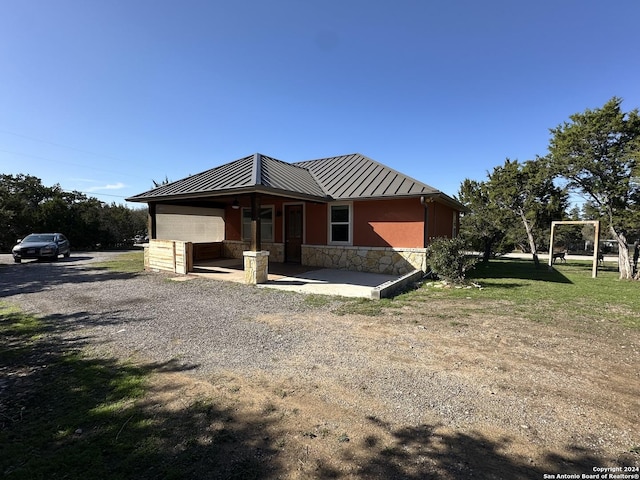 view of front of home with a front yard