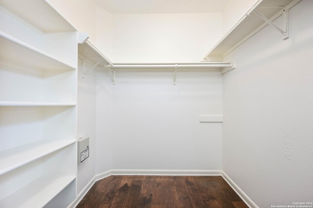 walk in closet featuring hardwood / wood-style flooring