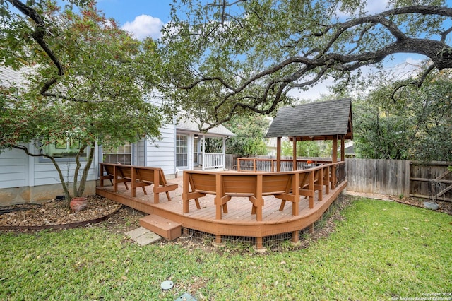 view of yard with a wooden deck